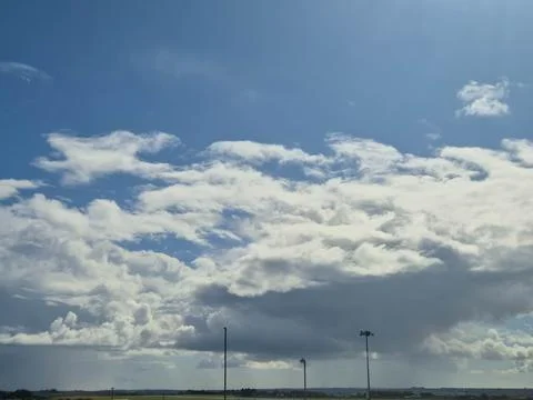 Cloudy sky with dramatic cumulus and blue weather atmosphere Stock Photos