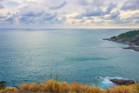 Cloudy sky with dry grass Stock Photos