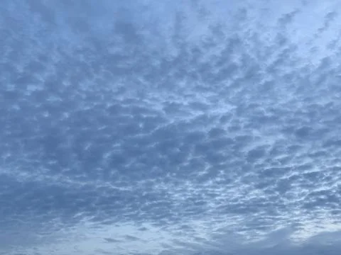 Cloudy sky during twilight in a serene location Stock Photos