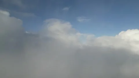 Cloudy sky with dynamic movement, camera pans through misty atmosphere Stock Footage 319544171