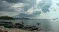 Cloudy sky at Flores beach with boats in Indonesia HD Footage