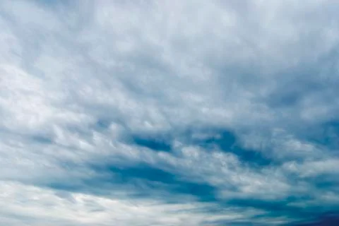 Cloudy sky full of deep grey clouds Stockfoto's