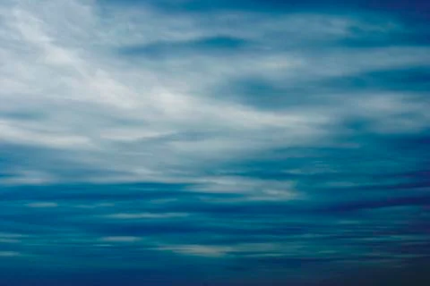 Cloudy sky full of deep grey clouds Stockfoto's