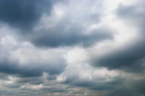 Cloudy sky full of deep grey clouds Fotos Stock