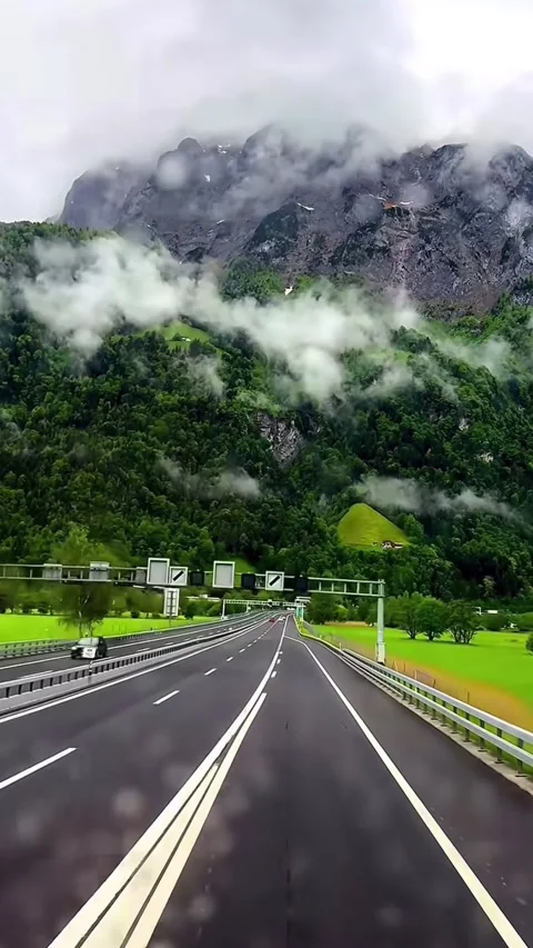 Cloudy sky green mountains Stock Footage 335323418