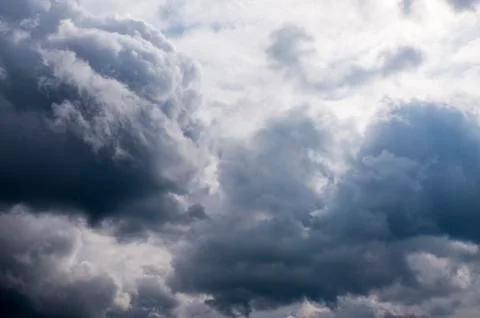 Cloudy sky with heavy clouds just before the storm Stock Photos