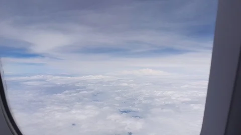 Cloudy Sky look from airplane window Stock Footage 116955151