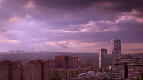 Cloudy sky over city, time lapse Stock Footage 76102696