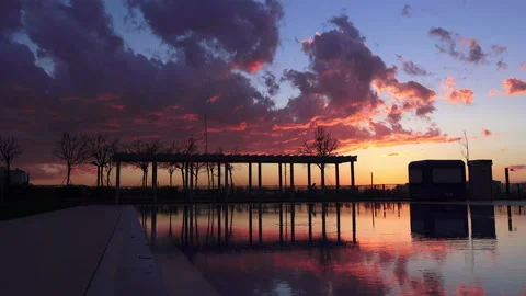 Cloudy sky over lake at sunset Stock Footage 87576399