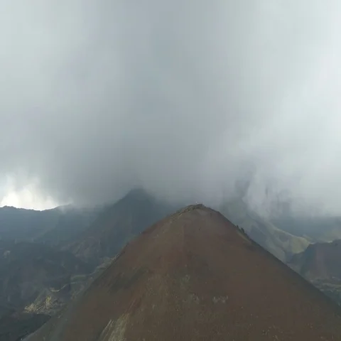 Cloudy sky over lateral crater of Etna volcano Stock Footage 69704050