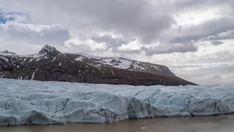 Cloudy sky over mountain and glacier Stock Footage 199290784