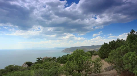 Cloudy sky over the mountains and the sea.  Stock Footage 29808339