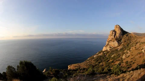 Cloudy sky over the mountains and the sea Stock Footage 34437761
