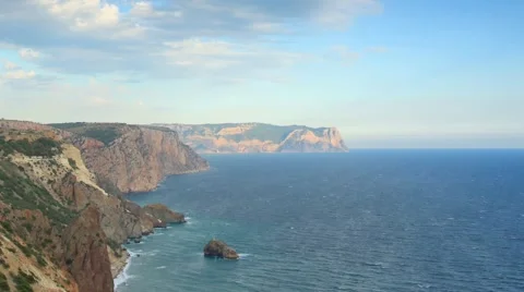 Cloudy sky over the mountains and the sea. Cape Fiolent, Crimea, Russia Video stock 40232717