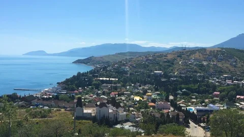 Cloudy sky over the mountains and the sea. Crimea, Russia. FULL HD Stock Footage 76604589