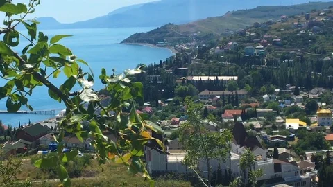 Cloudy sky over the mountains and the sea. Crimea, Russia. HD Stock Footage 76605823