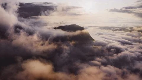 Cloudy sky over mountains background Stock Photos