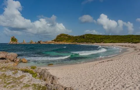 Cloudy sky over Pointe de Châteaux beach in Saint-Francois, Guadeloupe, FWI Stock Photos