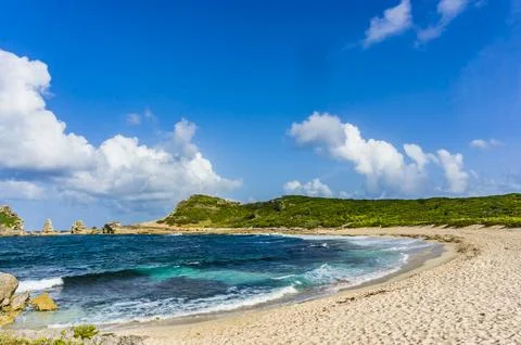 Cloudy sky over Pointe de Châteaux beach in Saint-Francois, Guadeloupe, FWI Stock Photos