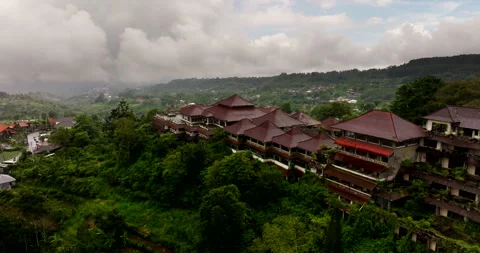 Cloudy sky over Pondok Indah Bedugul abandoned ghostly haunted eerie hotel Stock Footage 267951684