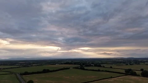 Cloudy Sky Over Rural Fields at Sunset Hyperlapse Stock Footage 340608707