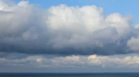 Cloudy sky over the sea Stock Footage 10704160