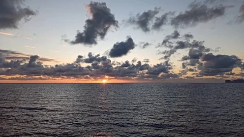 Cloudy sky over the sea at sunset in Alghero shore. Sardinia, Italy Stock Footage 126553145