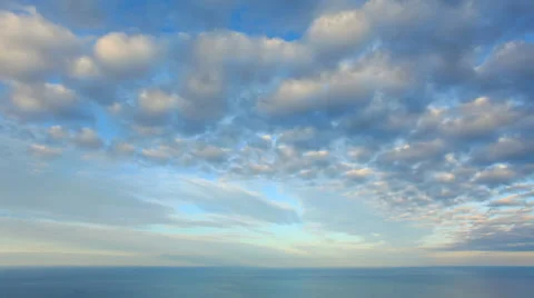 Cloudy sky over the sea (Time Lapse). FULL HD Stock Footage 32503119