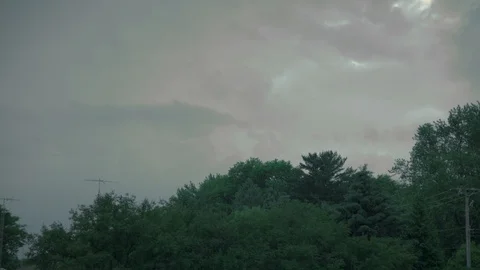 Cloudy Sky over Treeline Video stock 91875292