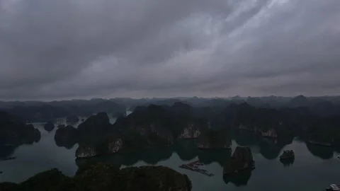 Cloudy sky over water with mountains in the background 5K rotation view Halong Stock Footage 273383944