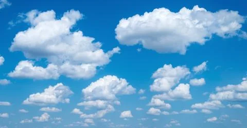 Cloudy sky. Panoramic view of cumulus clouds Stock Photos