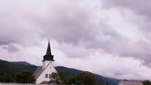 Cloudy sky with the peak of the church Stock Footage 197340432