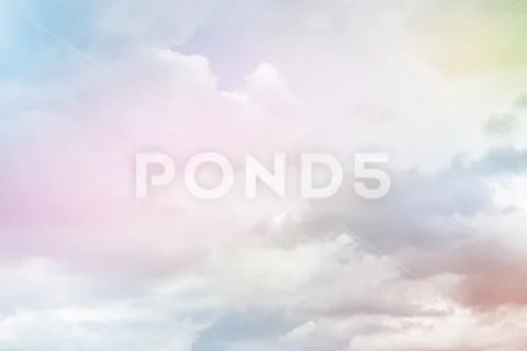 Cloudy sky pink and blue colors. Soft cloud background with a pastel colors. Stock Photos