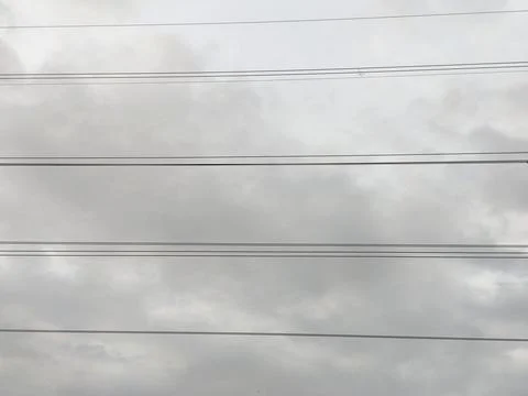 Cloudy Sky with Power Lines Stock Photos
