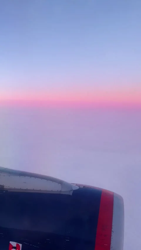 Cloudy sky, purple pink sunset, aerial view from airplane window Stock Footage 268879328