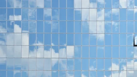 Cloudy sky reflection in business building glass Stock Footage 155142713
