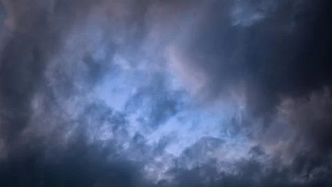 Cloudy sky with soft light creating abstract natural patterns. Stock Photos