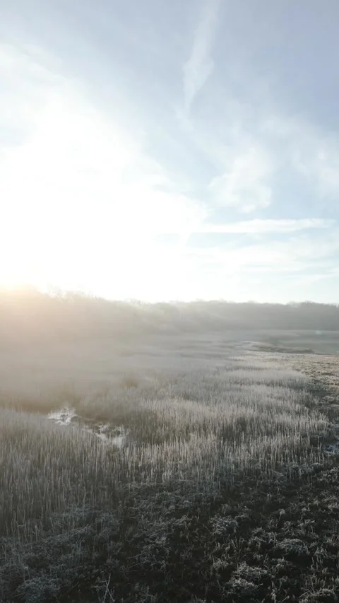 A cloudy sky with a sun shining through the clouds Stock Footage 298288925