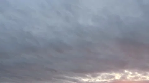 Cloudy sky at sunrise - beautiful clouds - natural sky background - time lapse Stock Footage 144373724