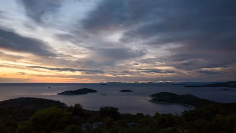 Cloudy sky at sunset over The Adriatic Sea Stock Footage 220526285