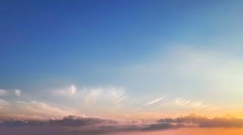 Cloudy sky at sunset. View from the airplane window. Stock Photos
