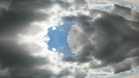 Cloudy sky in time lapse, artfully edited with blue sky and fluffy clouds Video stock 253527213