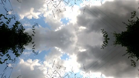 Cloudy sky in time lapse, artfully edited with blue sky and fluffy clouds Video stock 254167306