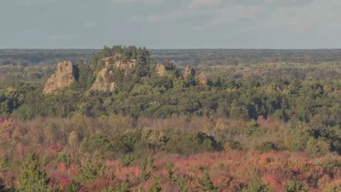 Cloudy Sky Timelapse over Jagged Rock in Wisconsin Video stock 144397345