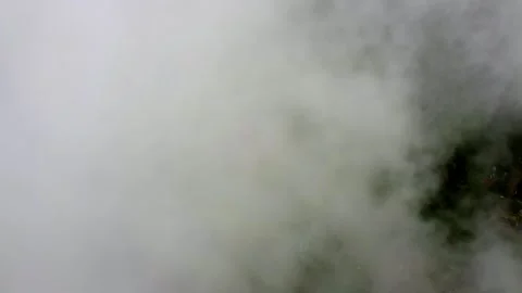 A cloudy sky with a town below Видео 317259894