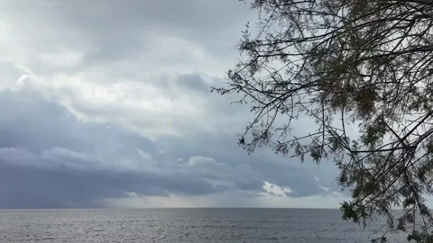 Cloudy sky video clip. Cloud over the sea dramatic video. 4k seascape horiz.. Stock Footage 303414226