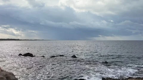 Cloudy sky video clip. Cloud over the sea dramatic video. 4k seascape horiz.. Stock Footage 303414483