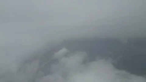 Cloudy sky view from airplane window, gradual transition through clouds Stock Footage 336963855
