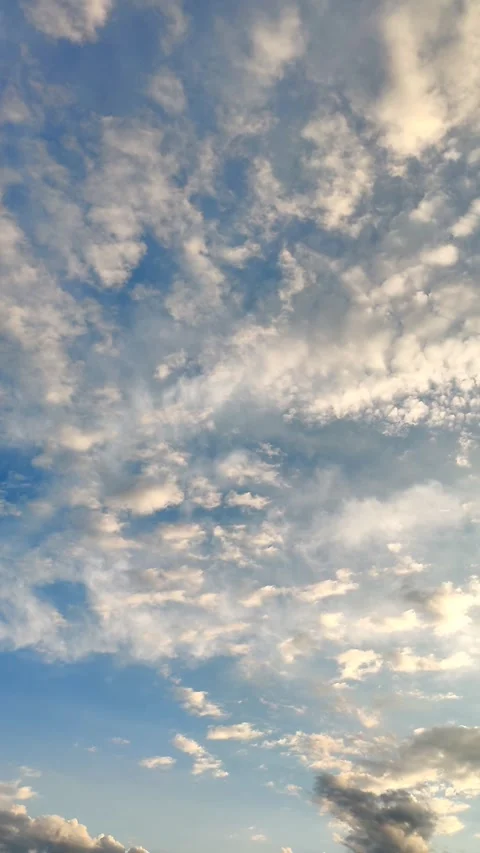 Cloudy sky. White atmospheric clouds in blue sky. Nature background, abstract Stock Footage 327902878