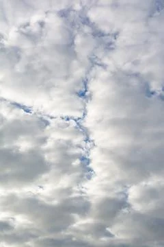 Cloudy sky with white clouds Stock Photos